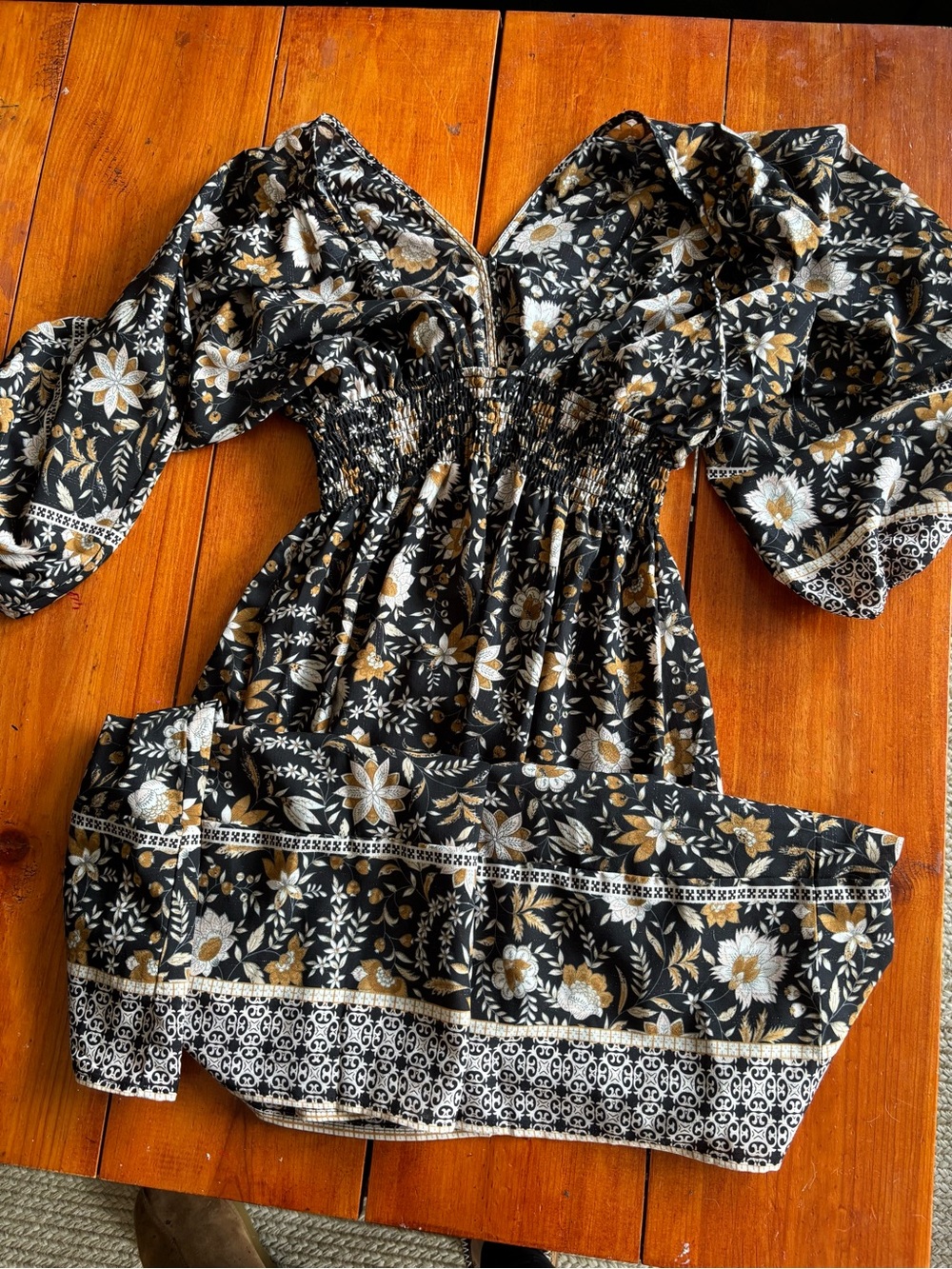 Cathy Jean Black Floral Smocked Puff-Sleeve Dress with Gold and White Accents